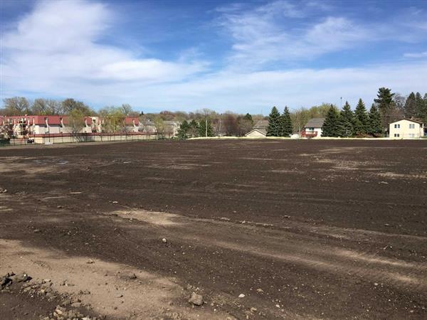 Rough grading at practice field